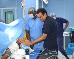 Dr. Mody With Patients
